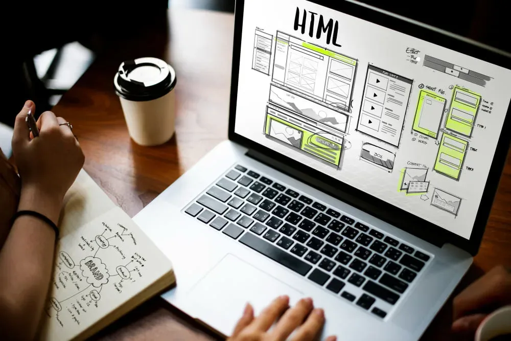 HTML web design tools alongside text detailing GroXDigital’s tailored website design services, including custom plans, unique builds, teamwork, and long-term support.